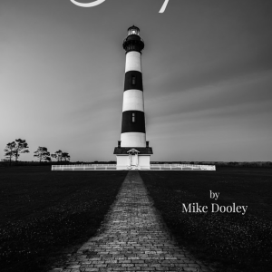Black and white photograph of the Bodie Island Lighthouse on the Outer Banks, North Carolina, captured by Mike Dooley.